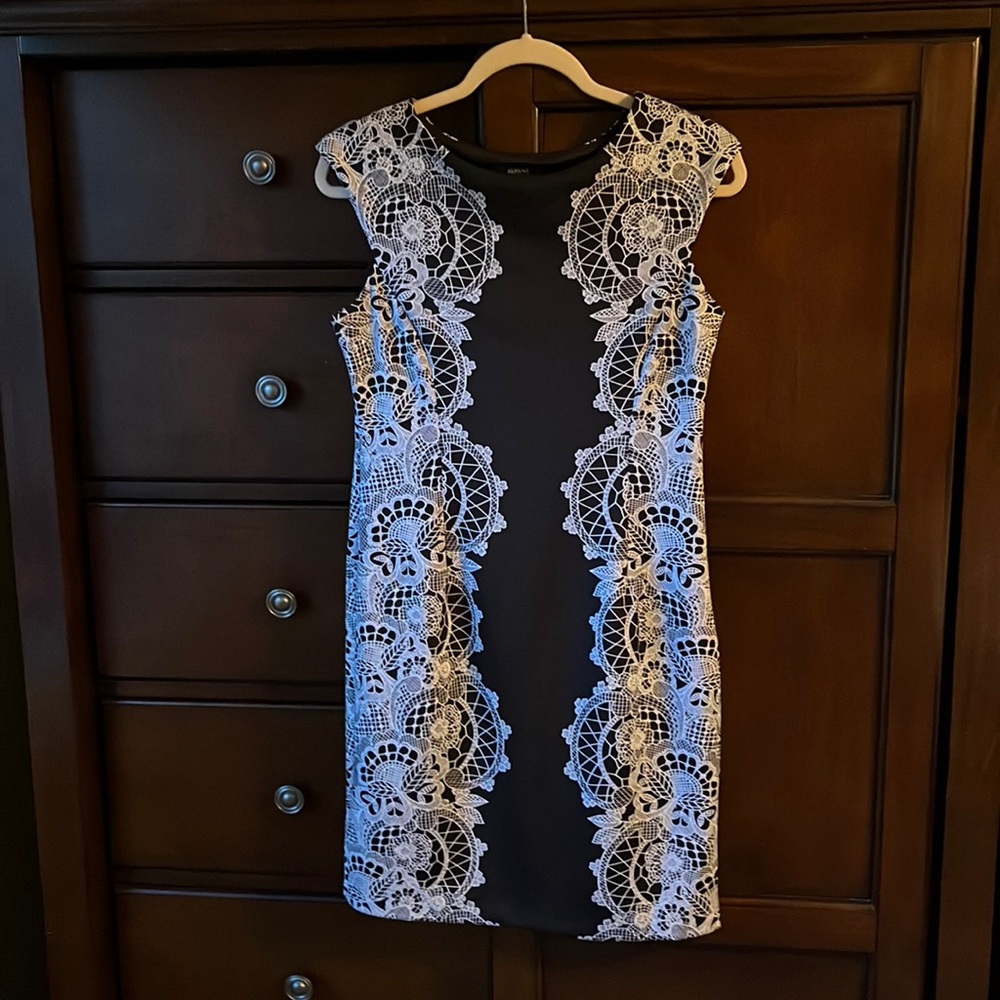 Never been worn. Preowned dress in excellent condition.